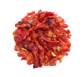 Photo of Aromatic spice. Red chili pepper flakes isolated on white, top view