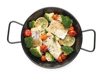 Photo of Tasty cod cooked with vegetables in frying pan isolated on white, top view