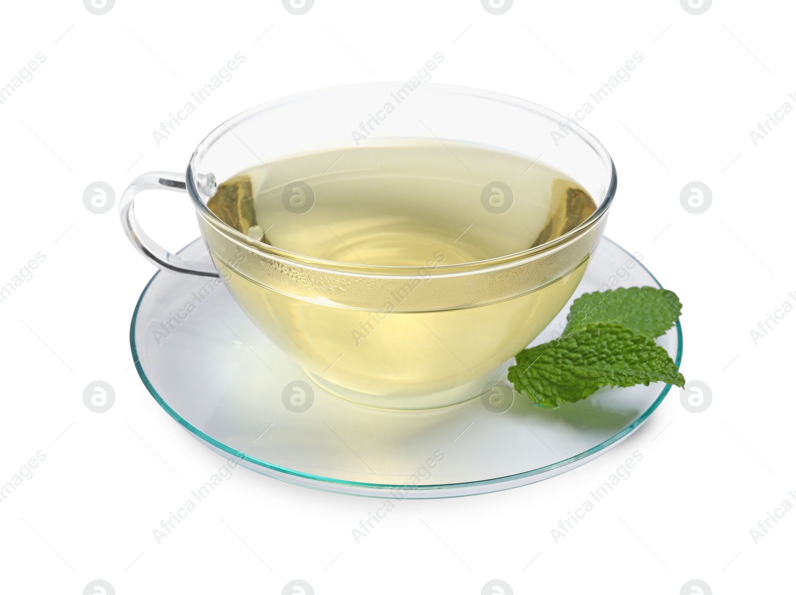 Photo of Refreshing green tea in cup and mint leaves isolated on white