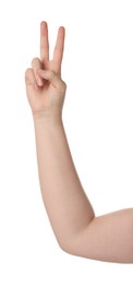 Photo of Playing rock, paper and scissors. Woman making scissors with her fingers on white background, closeup