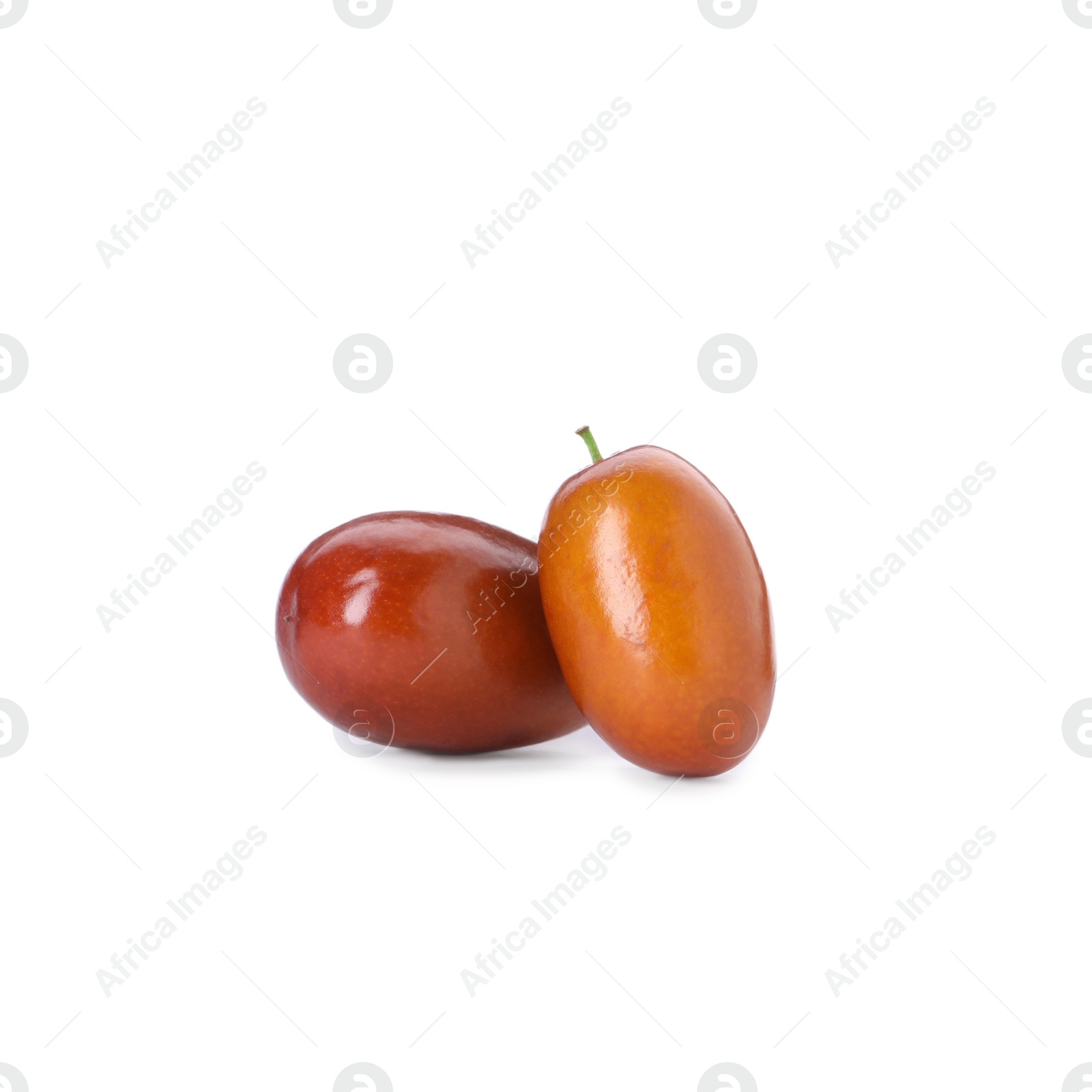 Photo of Two ripe red dates on white background