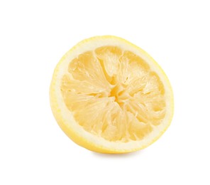 Photo of Half of squeezed lemon isolated on white