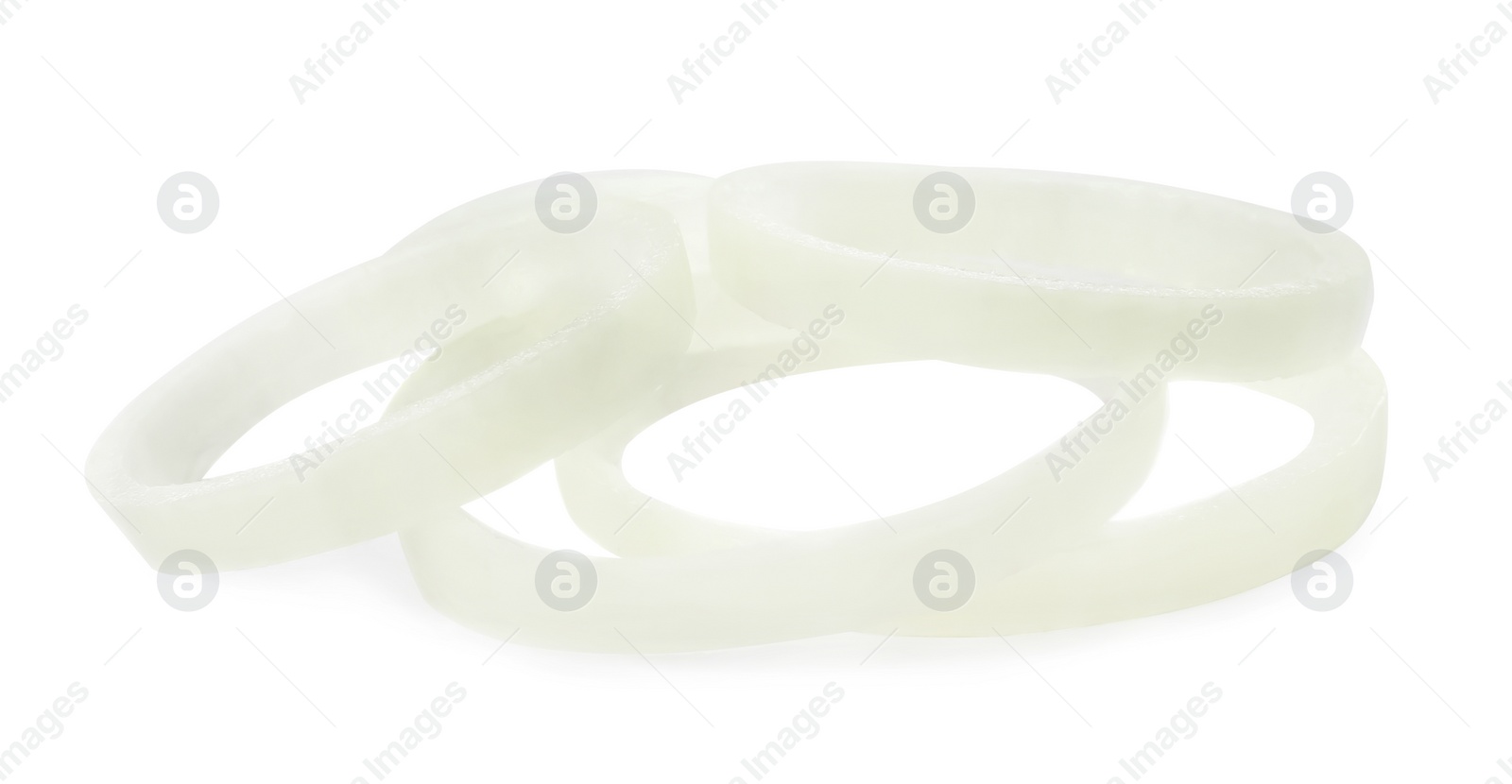 Photo of Fresh raw onion rings isolated on white