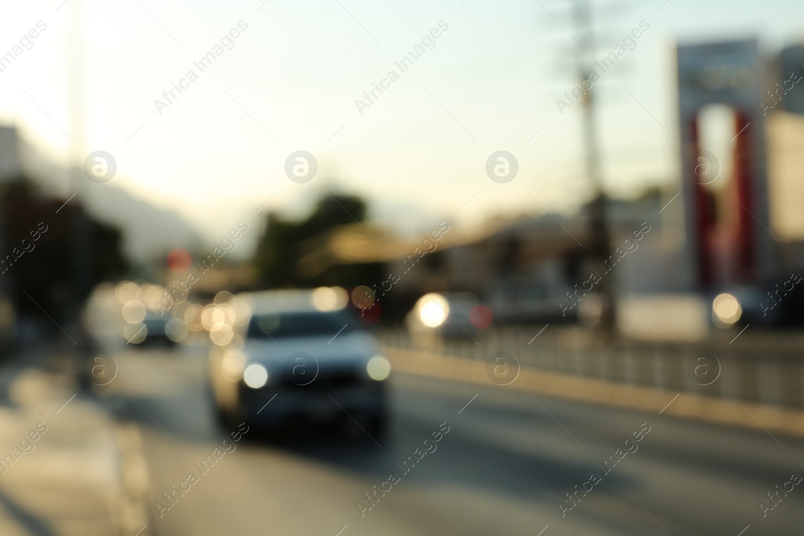 Photo of Blurred view of road with cars, bokeh effect