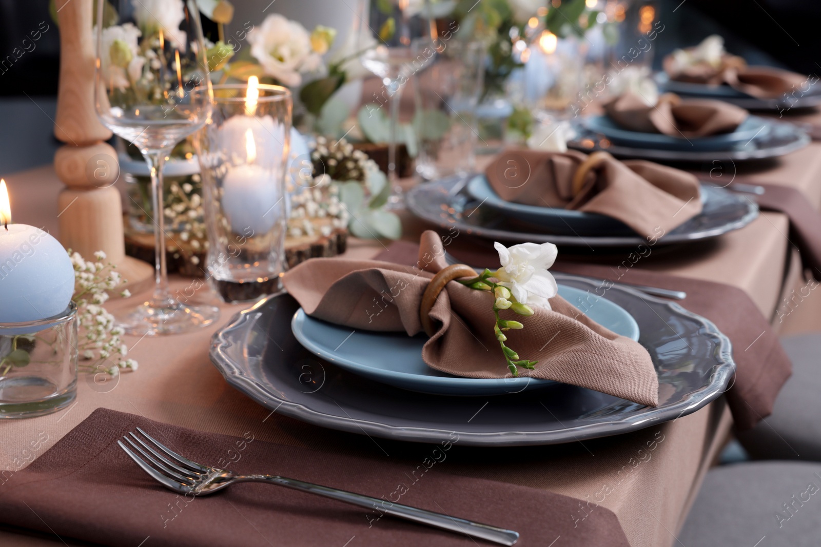 Photo of Elegant table setting with beautiful floral decor