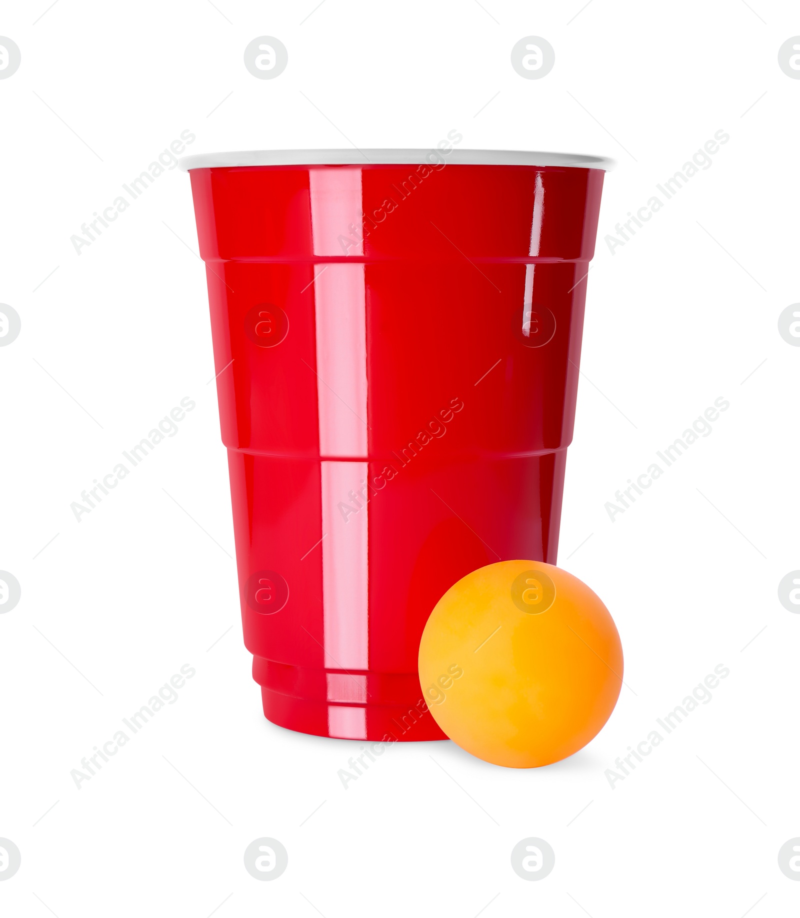 Photo of Red plastic cup and ball for beer pong on white background