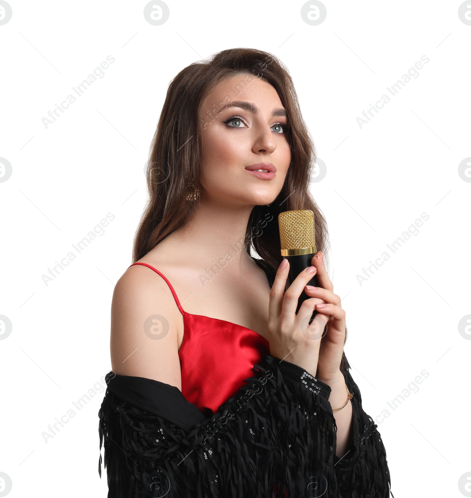 Photo of Beautiful young woman with microphone singing on white background