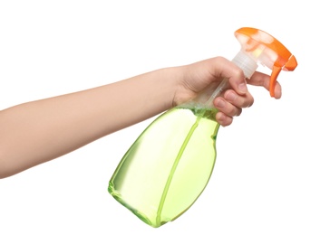 Image of Woman holding spray bottle with detergent on white background, closeup