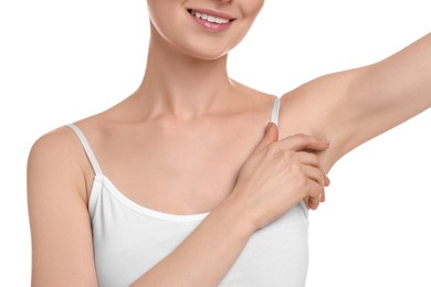 Photo of Woman showing armpit with smooth clean skin on white background, closeup