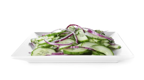 Photo of Plate with tasty cucumber salad on white background