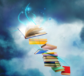 Image of Flying books with fairytales and magic lights on blue background. Creative design