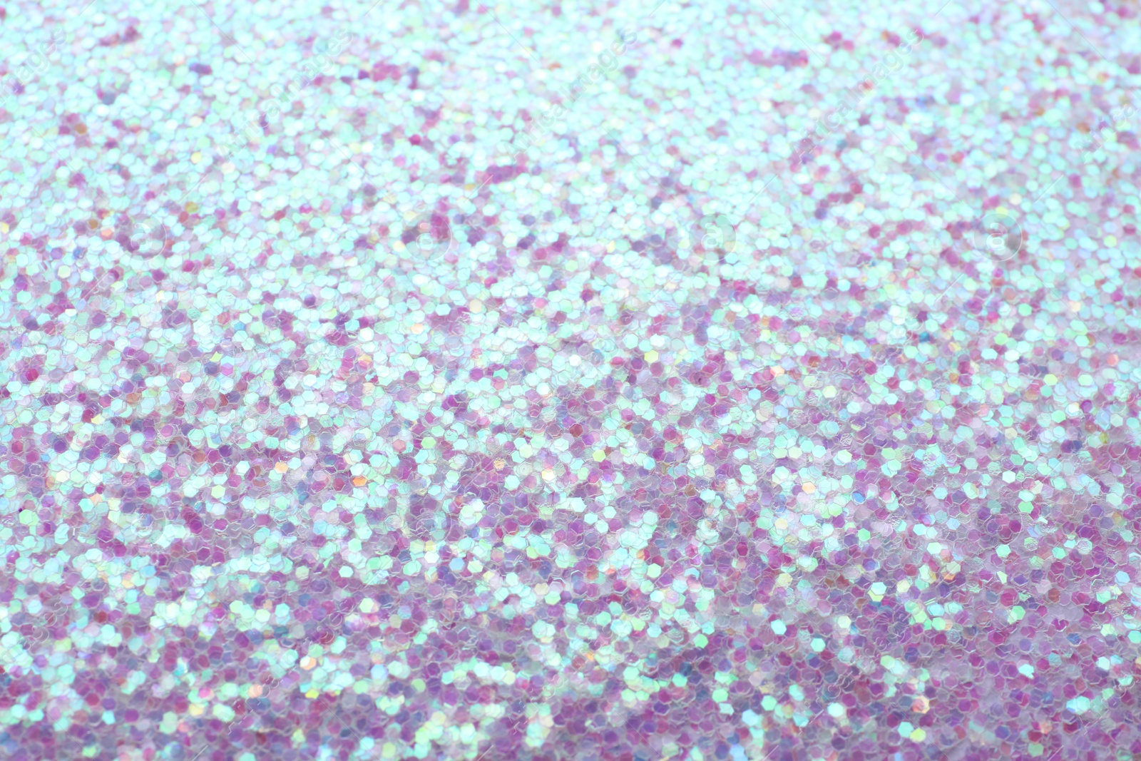 Photo of Beautiful shiny lilac glitter as background, closeup