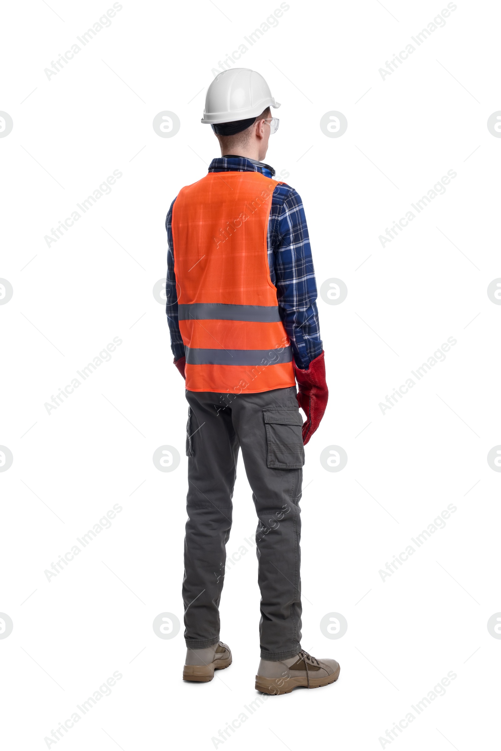 Photo of Young man wearing safety equipment on white background, back view