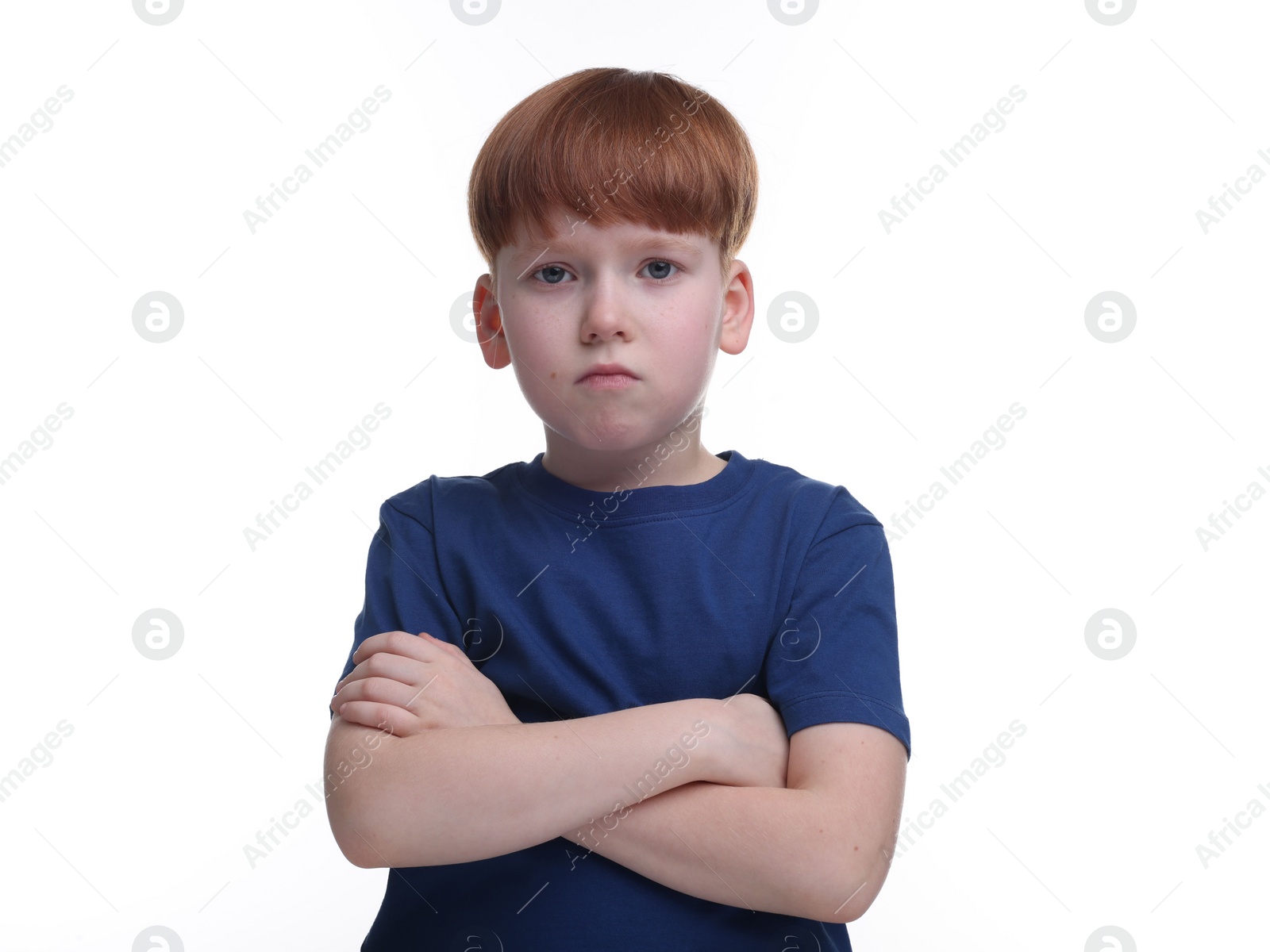 Photo of Portrait of sad little boy on white background