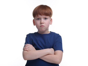 Portrait of sad little boy on white background