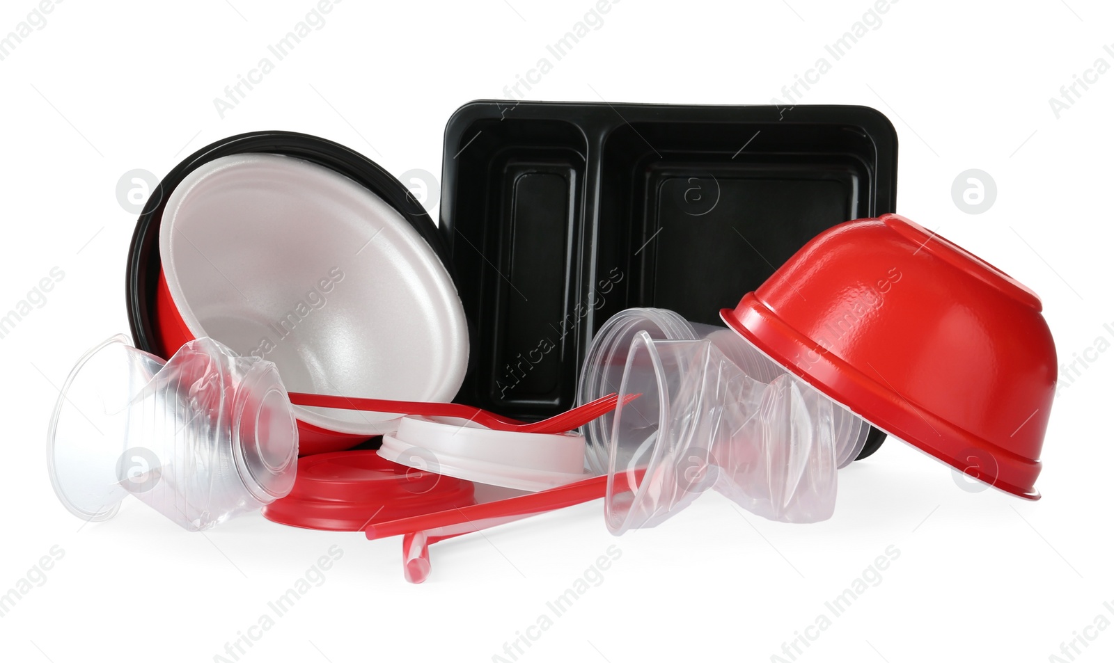 Photo of Pile of different plastic items on white background