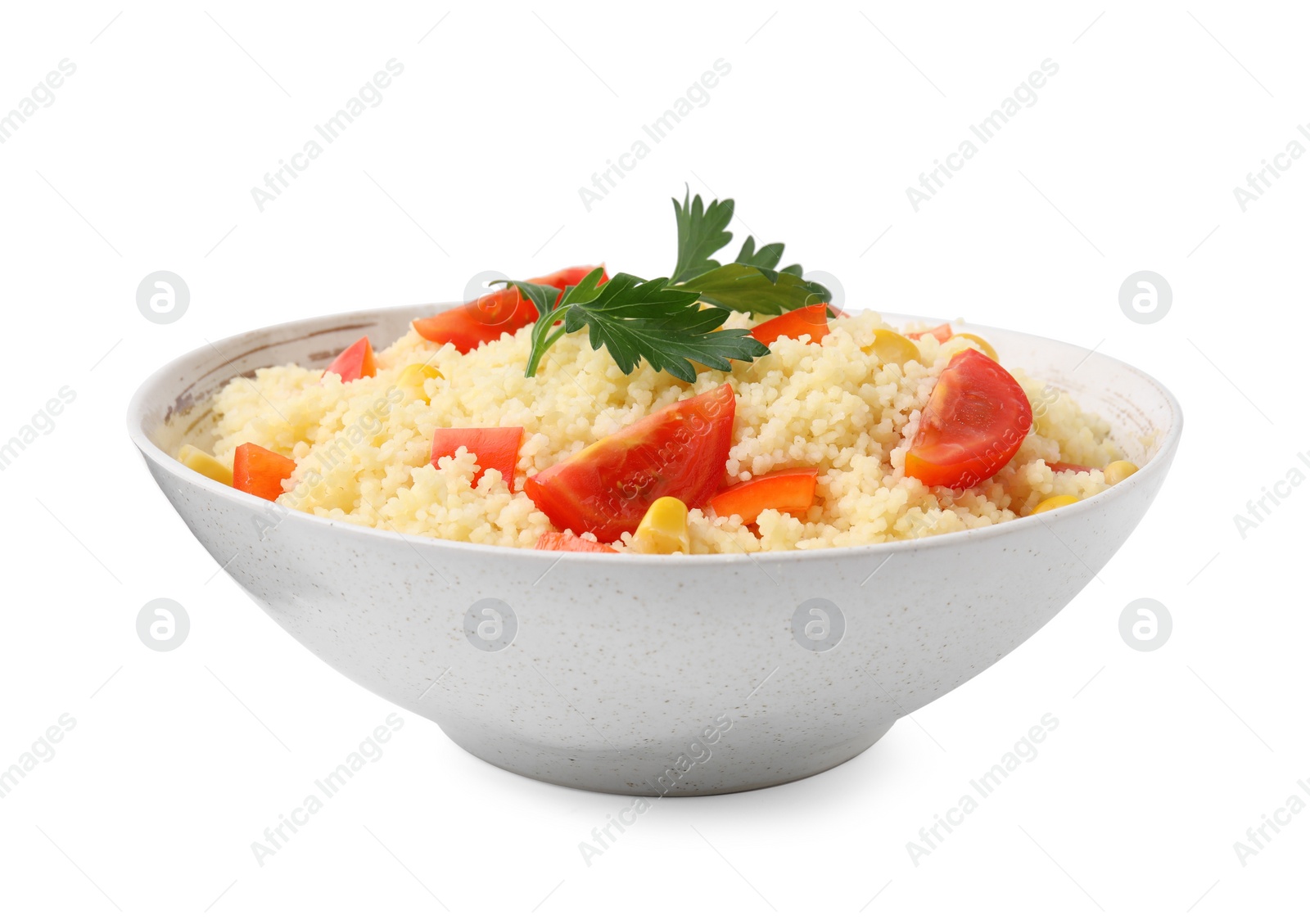 Photo of Tasty couscous with parsley, corn and tomatoes in bowl isolated on white