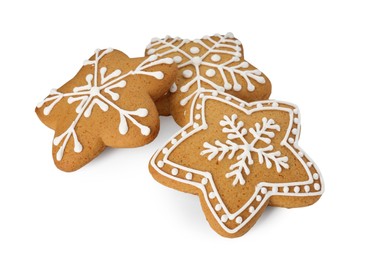 Tasty star shaped Christmas cookies with icing isolated on white