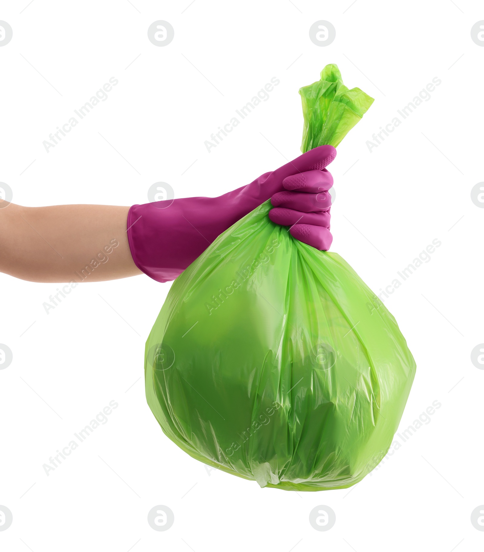 Photo of Woman holding plastic bag full of garbage on white background, closeup