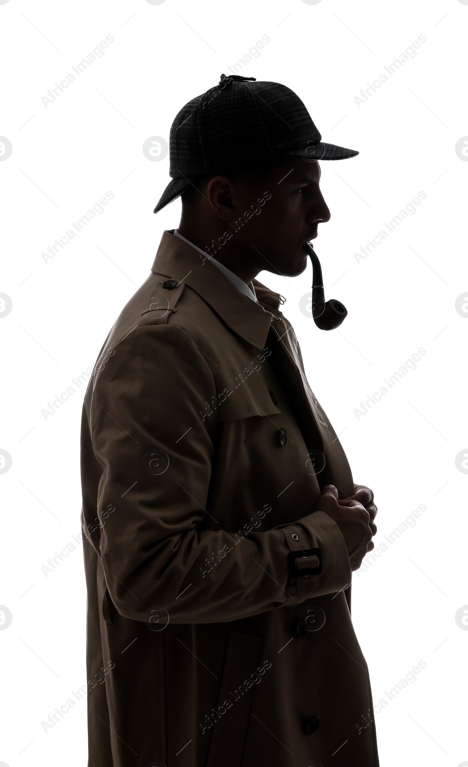 Photo of Old fashioned detective with smoking pipe on white background