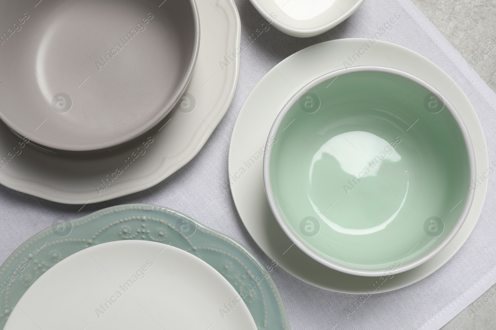 Photo of Beautiful ceramic dishware on table, top view