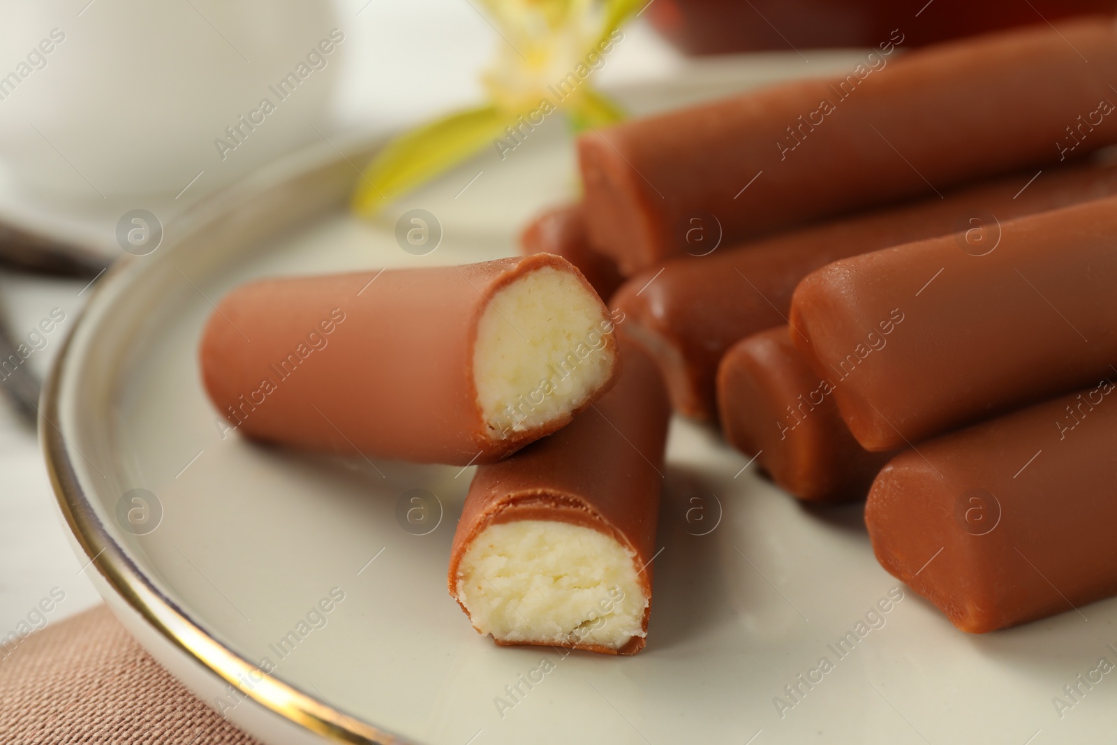 Photo of Glazed curd cheese bars on table, closeup