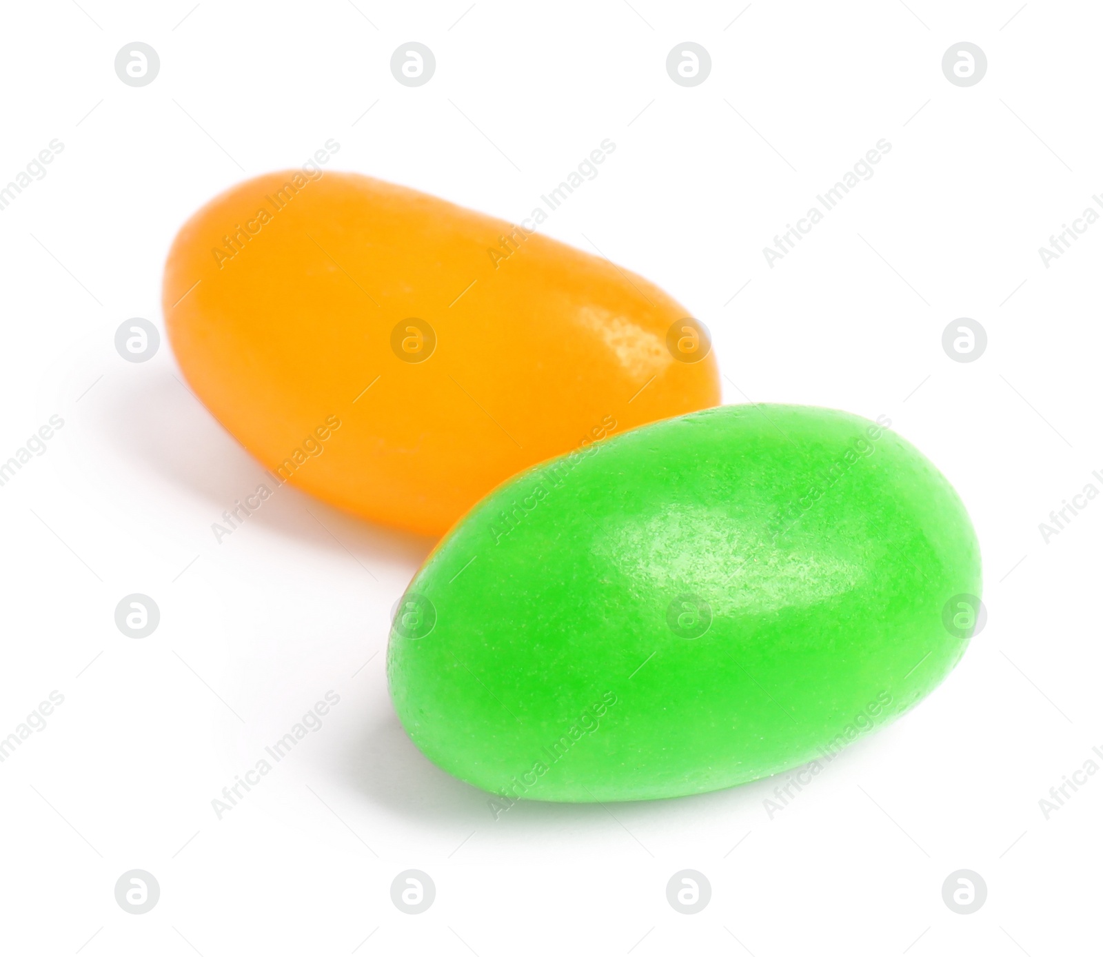 Photo of Delicious colorful jelly beans isolated on white