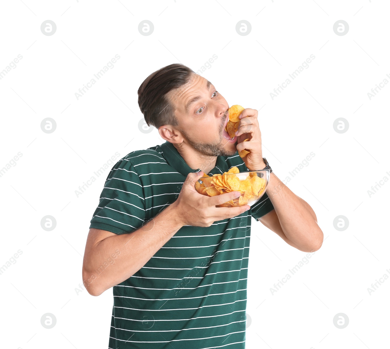 Photo of Man eating potato chips on white background