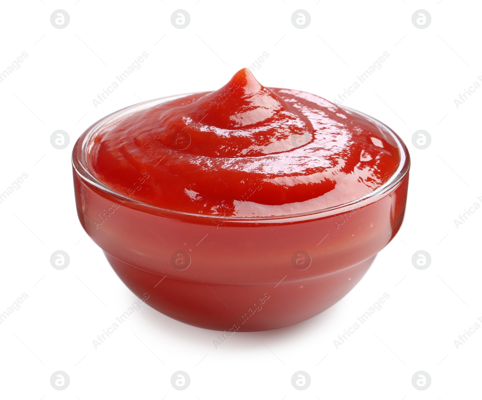 Photo of Tasty ketchup in glass bowl isolated on white. Tomato sauce