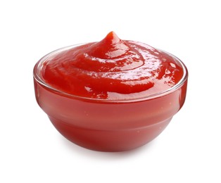 Photo of Tasty ketchup in glass bowl isolated on white. Tomato sauce