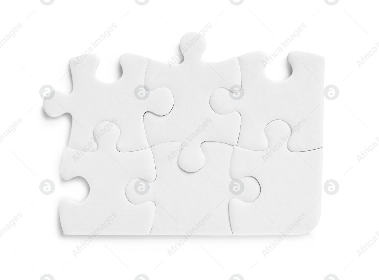 Photo of Blank puzzle pieces isolated on white, top view