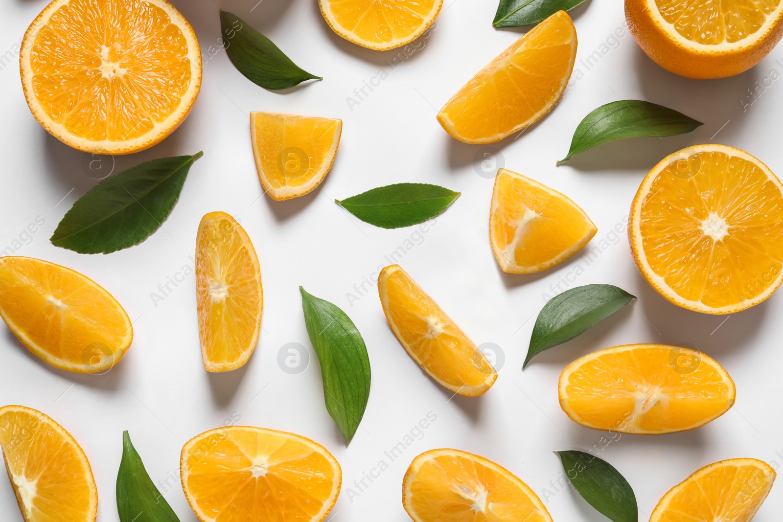 Photo of Composition with ripe oranges on white background, top view