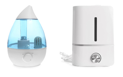 Image of Two modern air humidifiers on white background