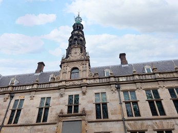 Beautiful old building against cloudy sky, low angle view