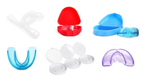 Set with different mouth guards on white background. Bite correction treatment