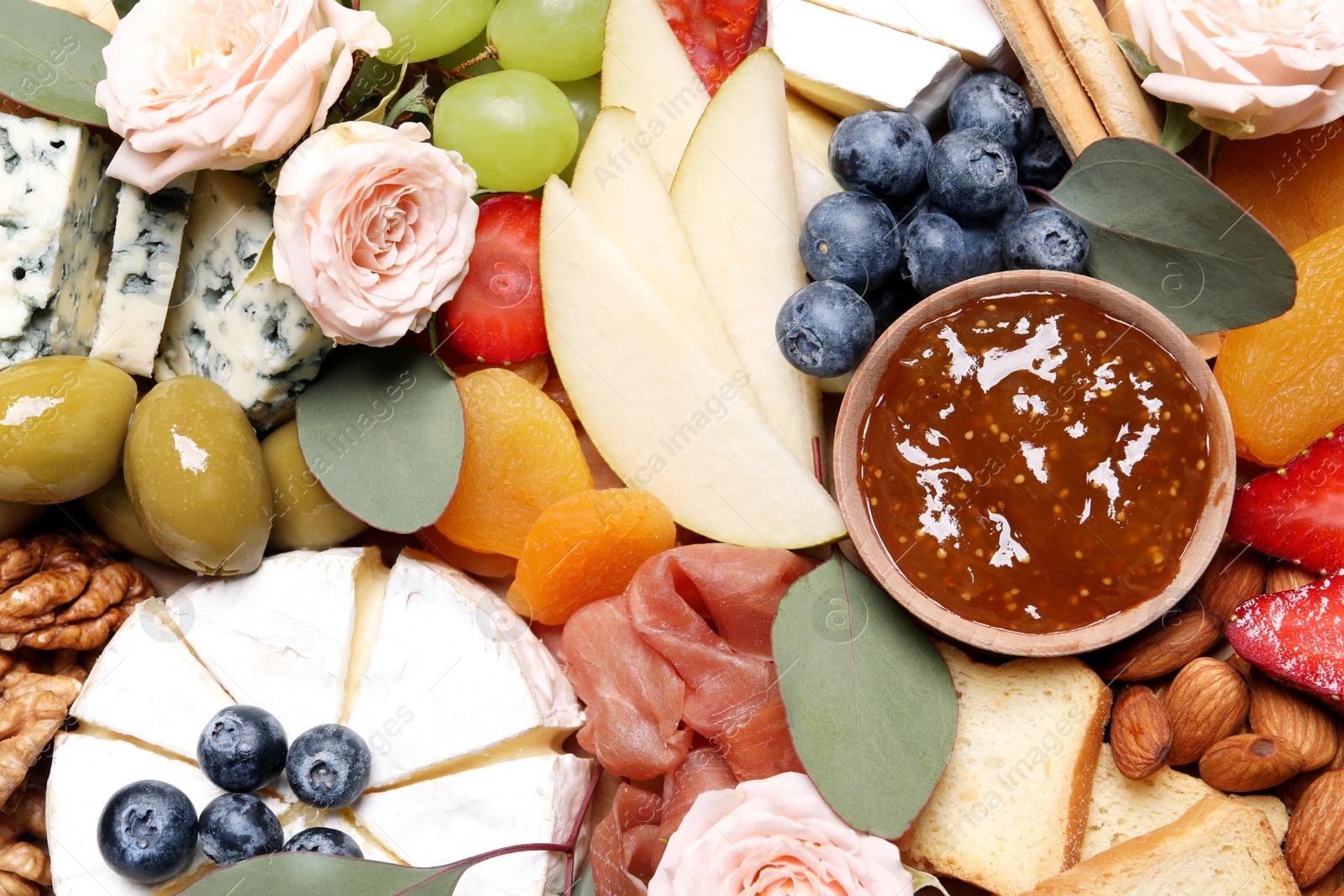 Photo of Tasty assorted appetizers as background, top view