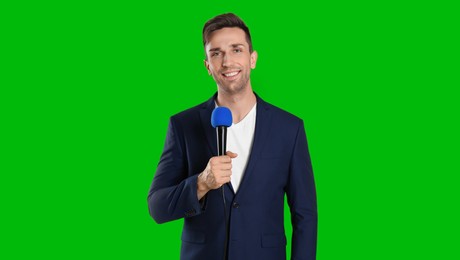 Image of Chroma key compositing. Broadcaster with microphone against green screen, banner design