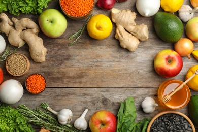 Photo of Flat lay composition with natural products and space for text on wooden background. Home remedies for asthma