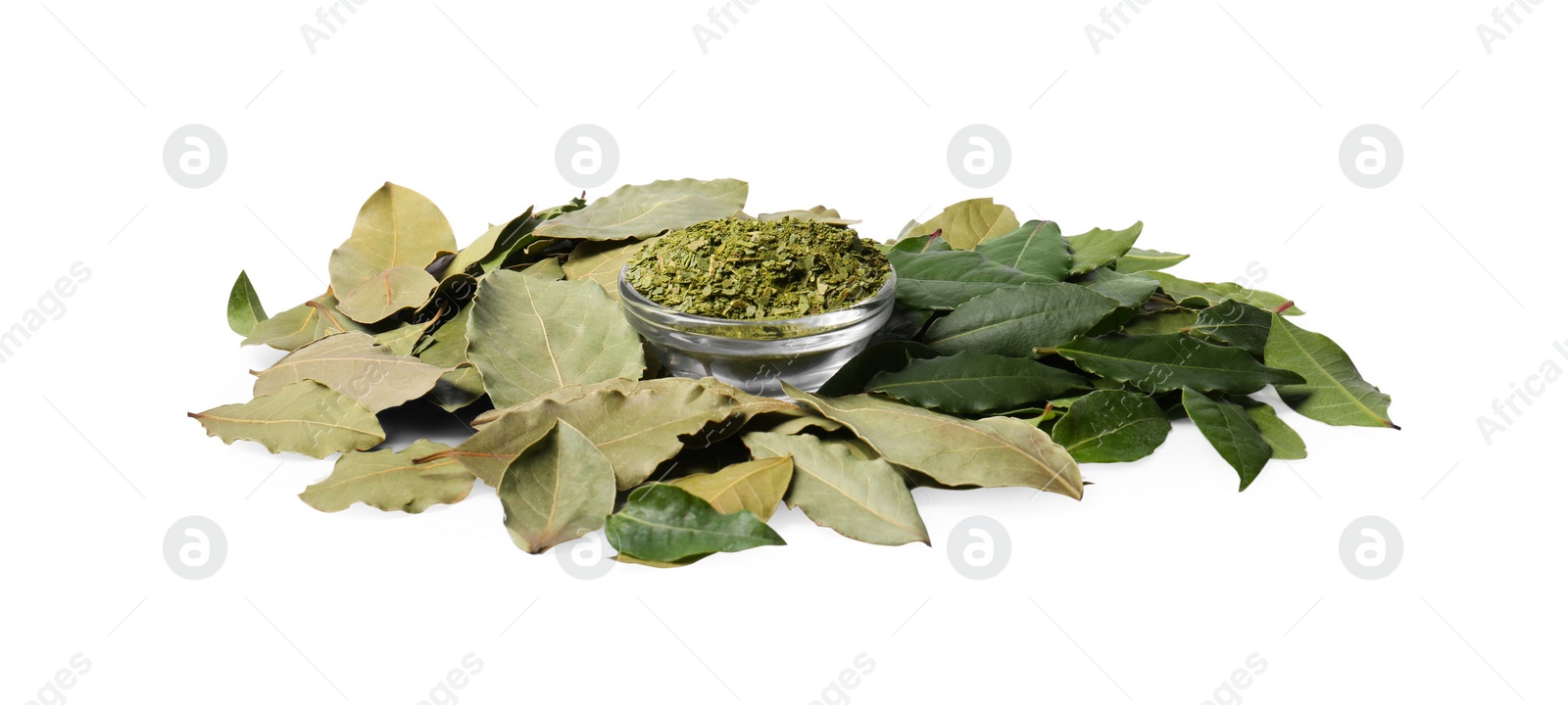 Photo of Fresh and ground bay leaves on white background