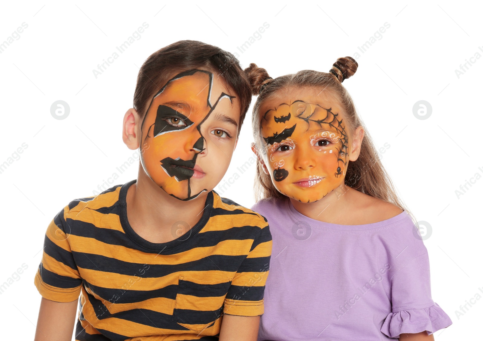 Photo of Cute little children with face painting on white background