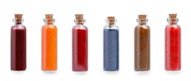 Image of Set of different powdered food coloring in bottles isolated on white