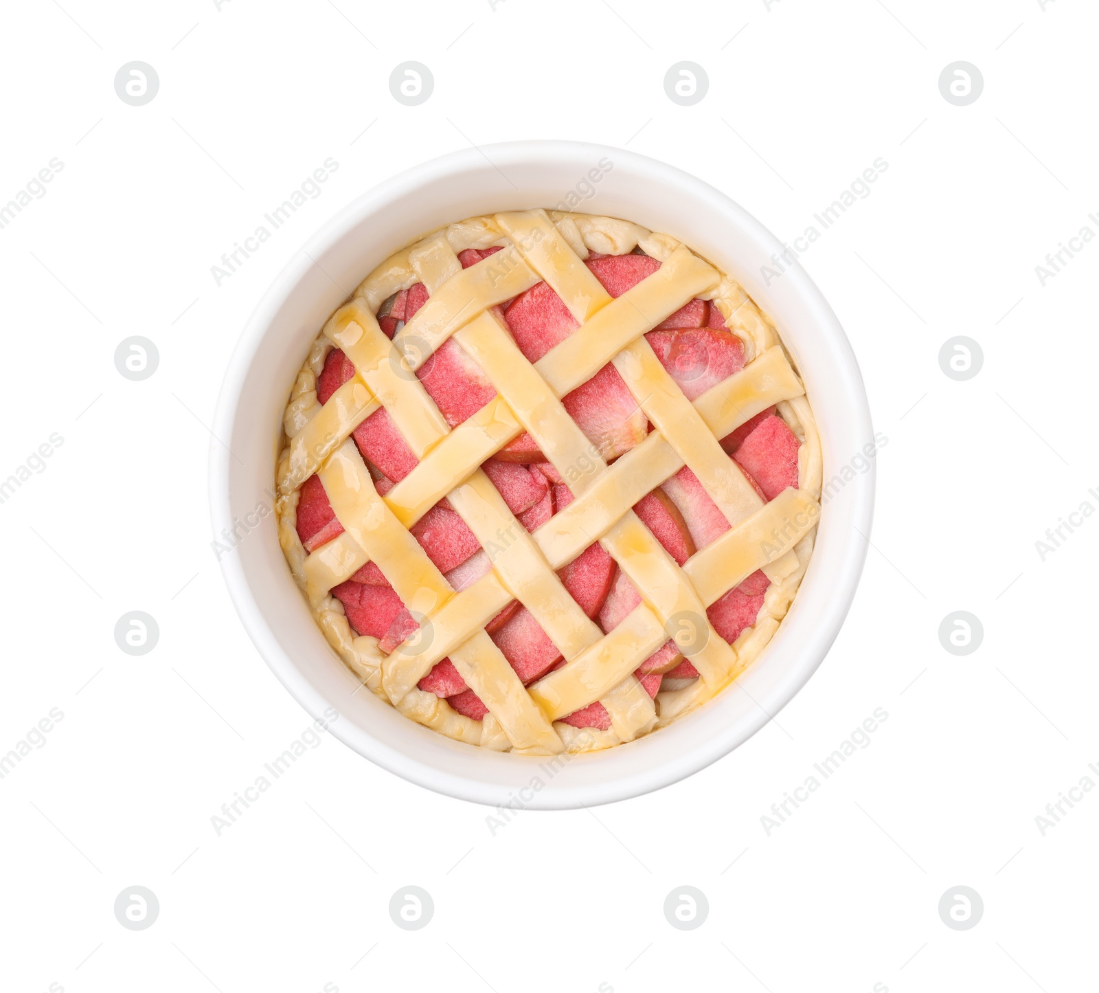 Photo of Baking dish with raw apple pie isolated on white, top view