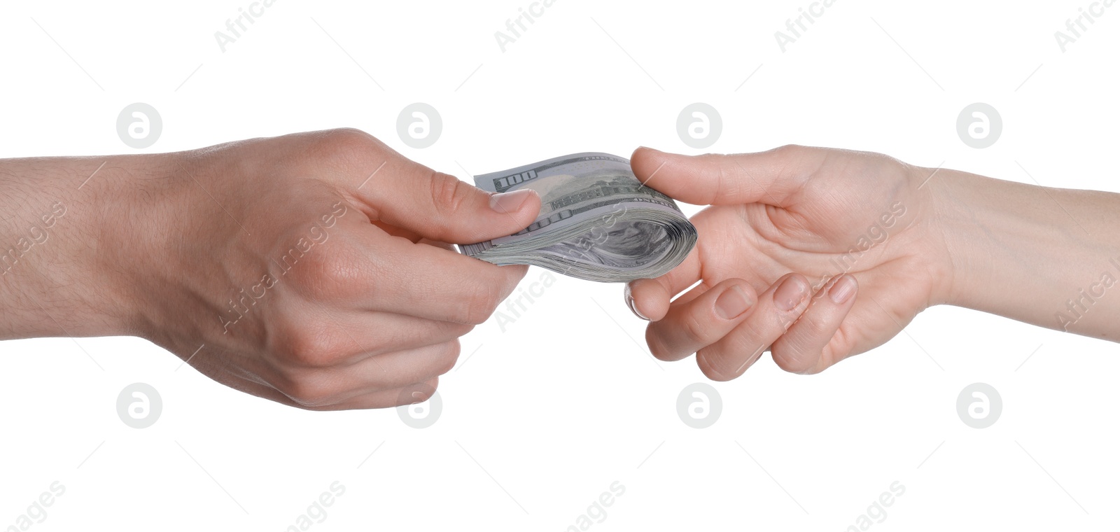 Photo of Money exchange. Man giving dollar banknotes to woman on white background, closeup