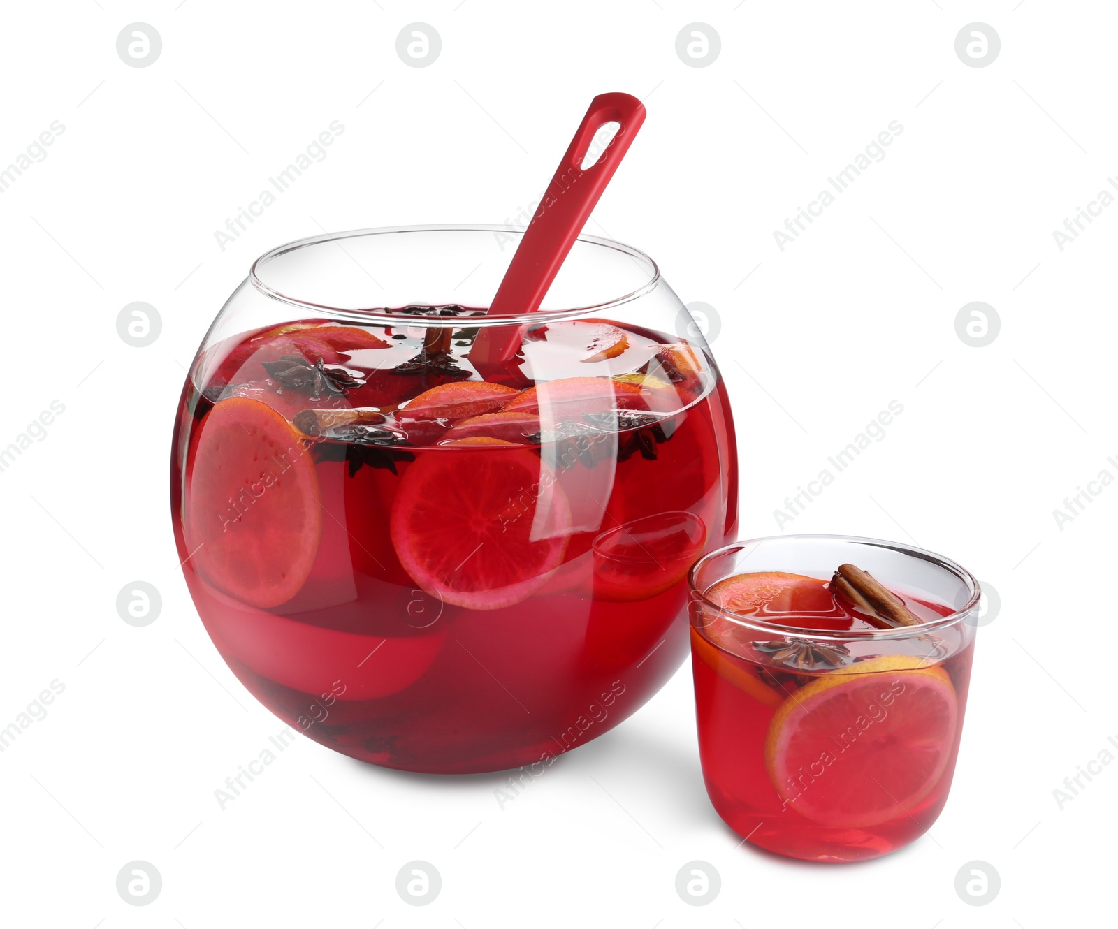 Photo of Glass and bowl of delicious aromatic punch drink on white background