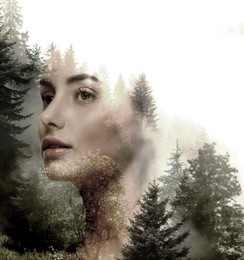 Double exposure of beautiful woman and foggy forest in mountains