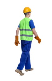Young man wearing safety equipment on white background, back view