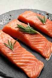 Photo of Fresh raw salmon and ingredients for marinade on grey, closeup
