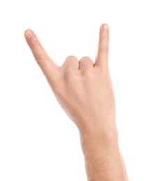 Photo of Man showing rock gesture on white background, closeup of hand