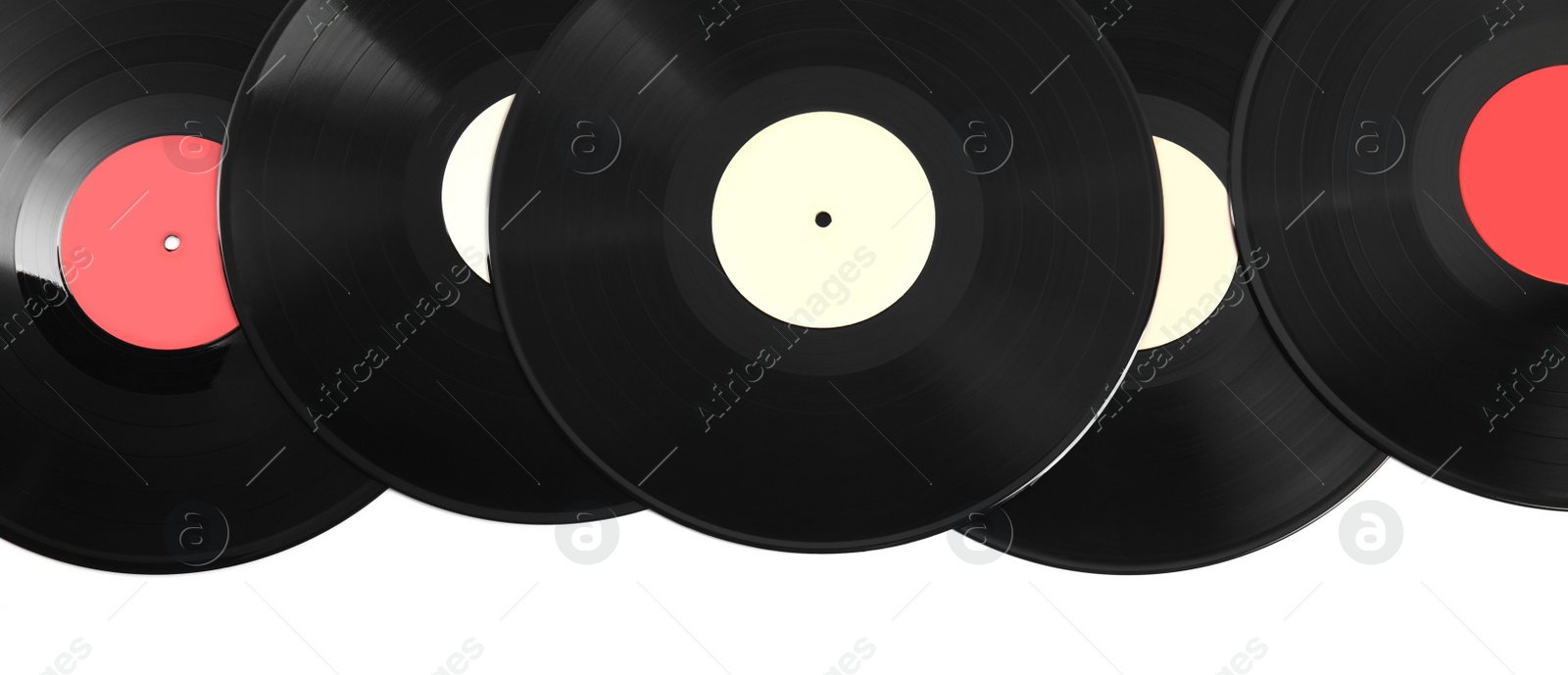 Photo of Vintage vinyl records on white background, top view