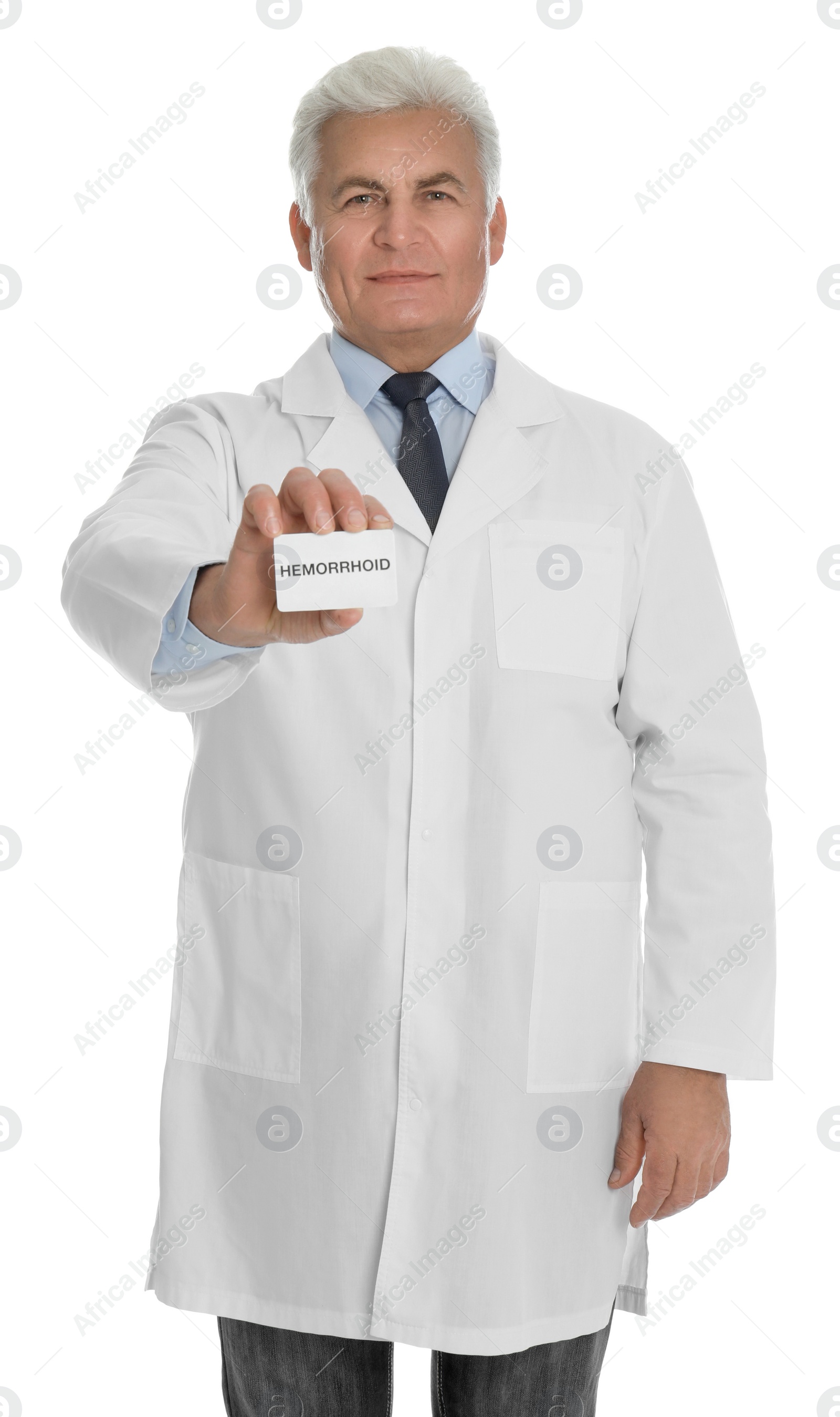 Photo of Doctor holding business card with word HEMORRHOID on white background